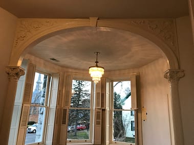 classical columns, composite columns, decorative columns, restoration, preservation, white columns, white louvered shutters, victorian shutters, arched entry way, millwork